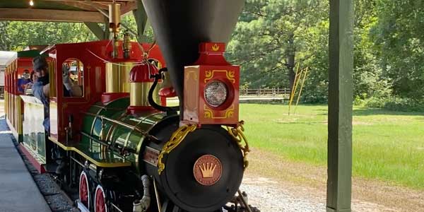 Steam locomotive Pulling Passenger Cars Shown Ente