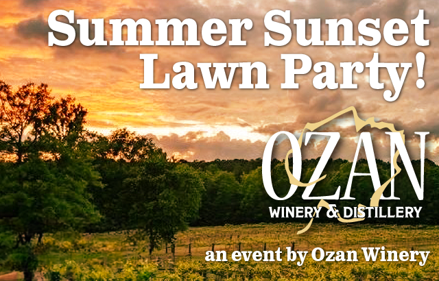 A vineyard with trees and a sunset.